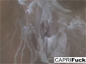 Capri luvs to finger her cock-squeezing vag